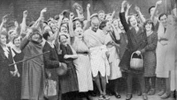 With women workers in a Lancashire cotton mill